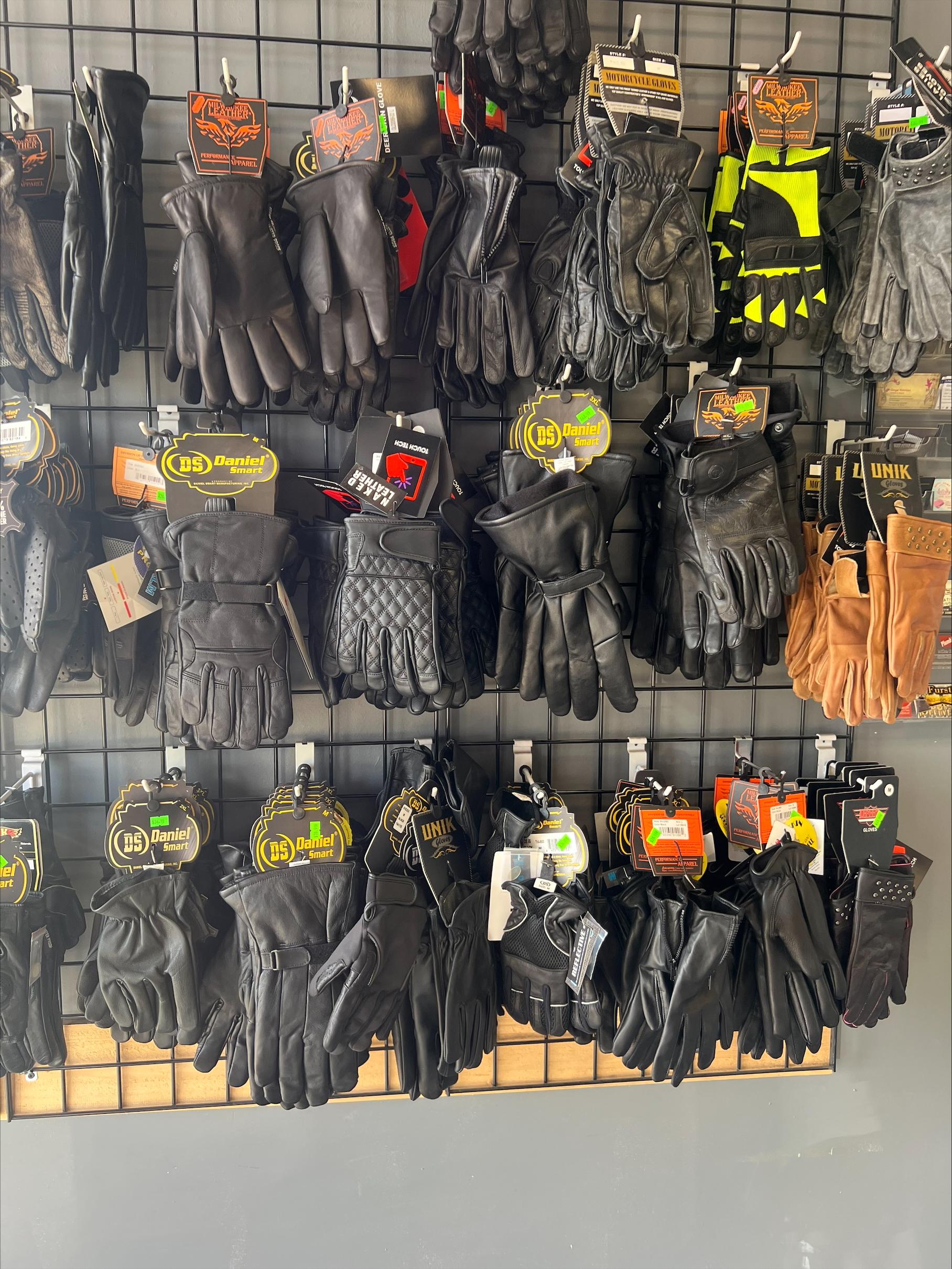 Gloves and riding accessories on display