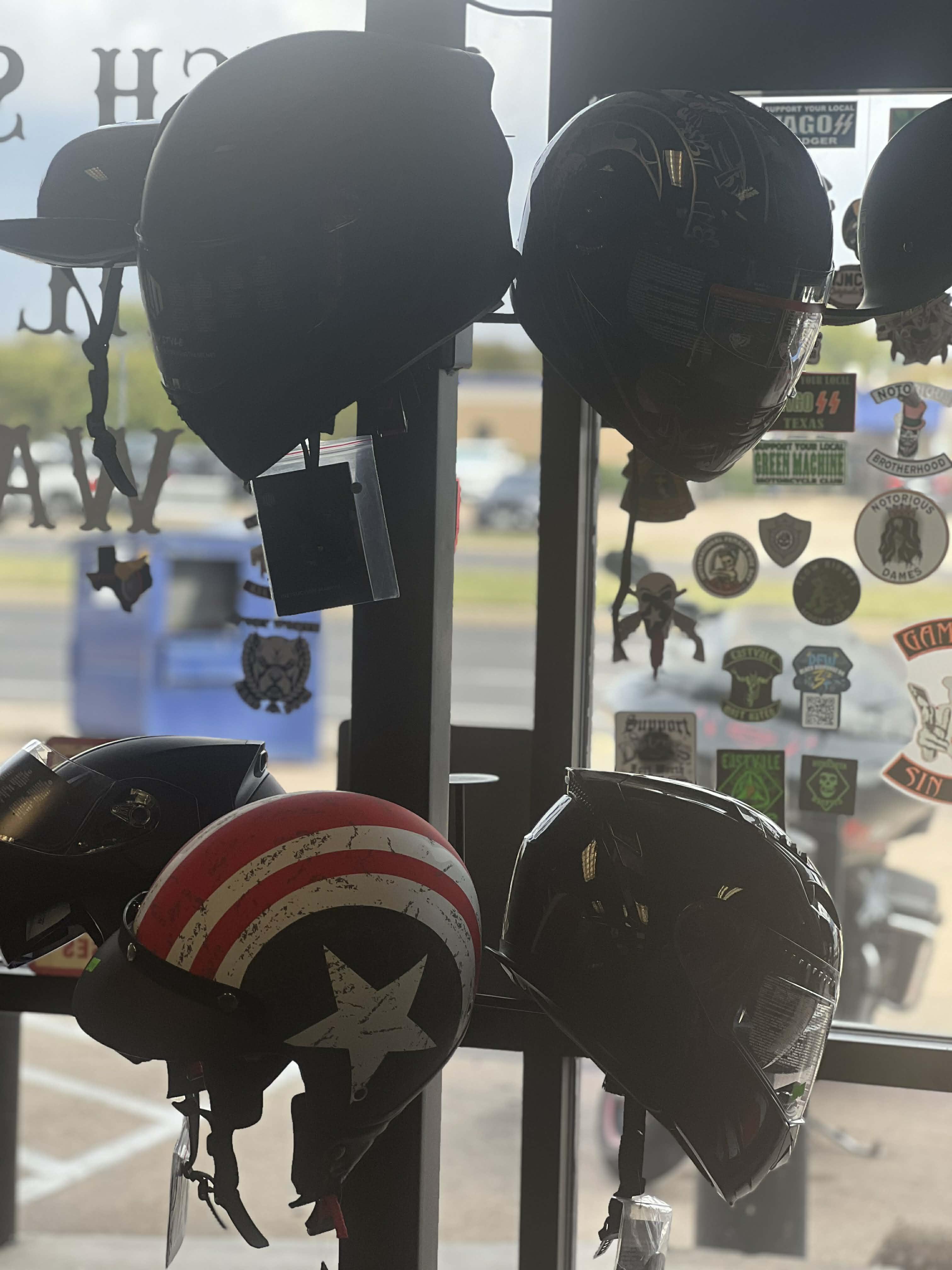 Selection of motorcycle helmets on display